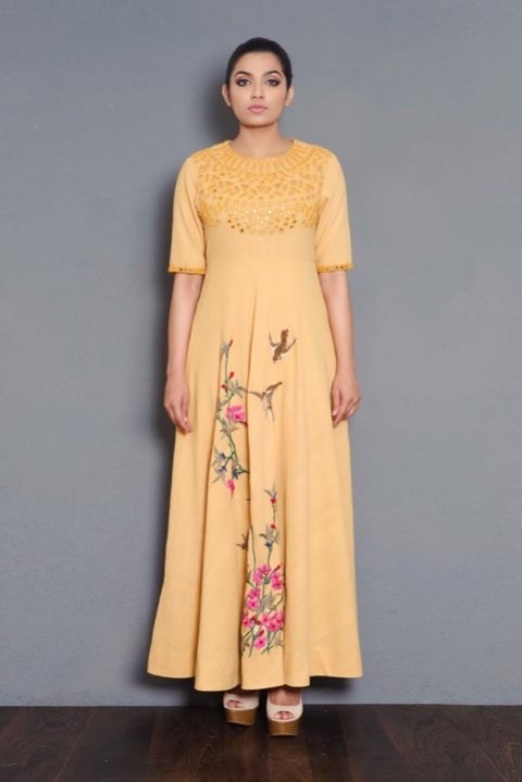 Yellow Handwoven mirror and hand embroidered dress
