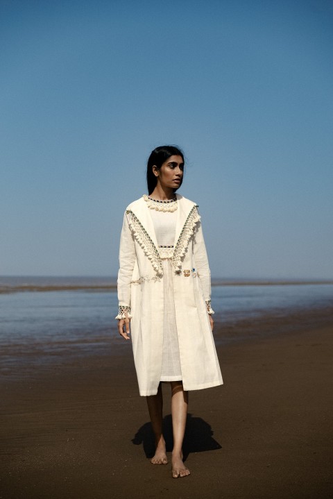 Off-white Handwoven tassel detailing flap collar hand embroidered long jacket